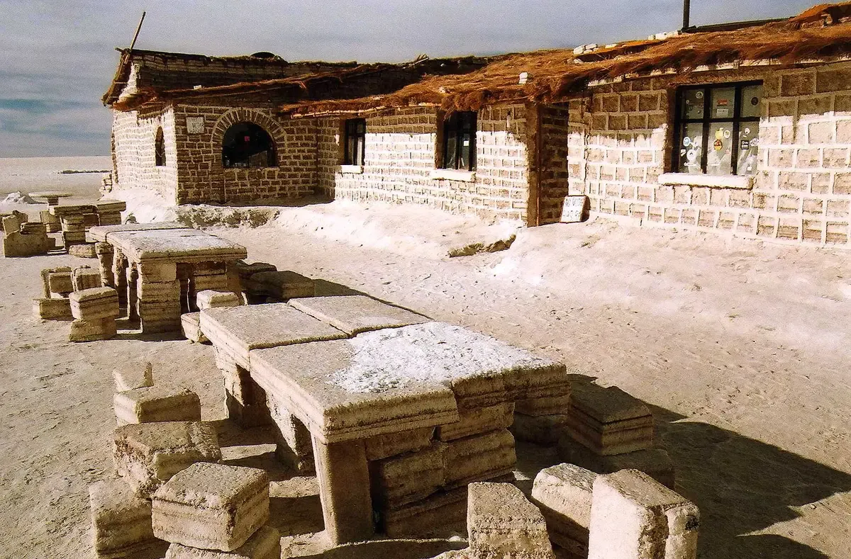 Salt-block tables outside the old salt hotel on the salar on an Uyuni salt flats tour